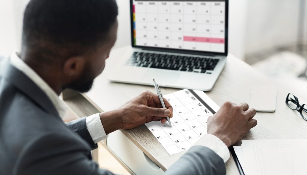 black businessman using calendar program on laptop 2021 08 29 23 01 02 utc