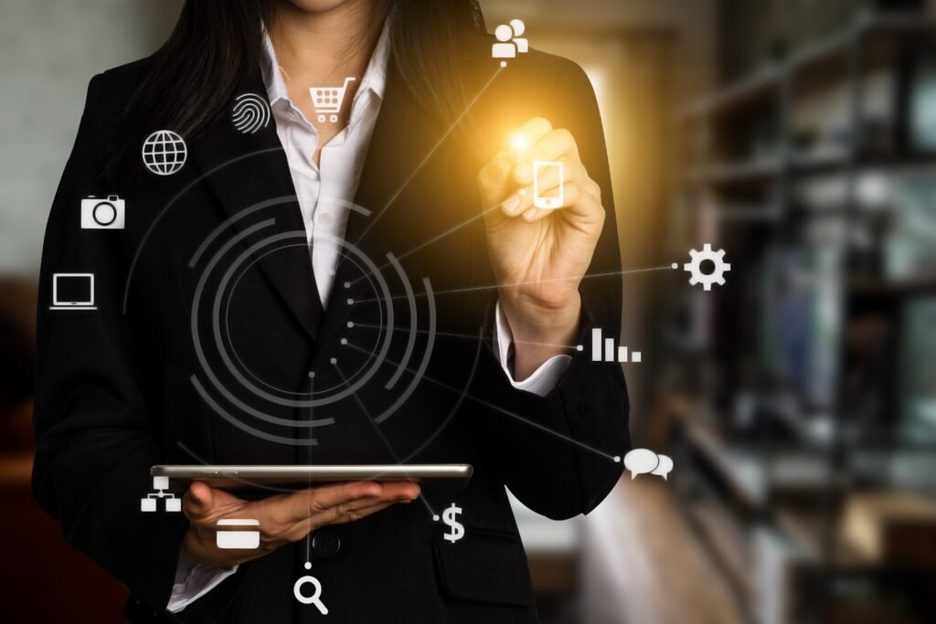 SEO Businesswoman using tablet with digital interface icons overlaying the image.