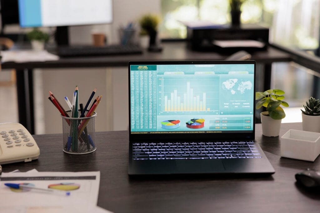 laptop computer displaying graphs and charts 2023 11 27 05 11 01 utc